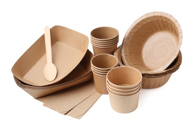 Photo of Set of disposable tableware isolated on white