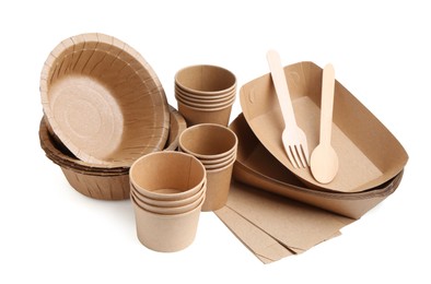 Photo of Set of disposable tableware isolated on white