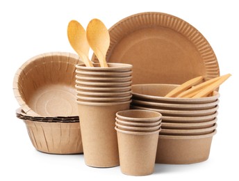 Photo of Set of disposable tableware isolated on white