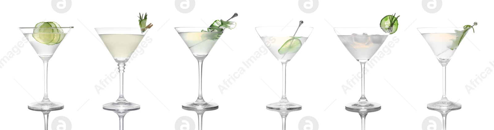Image of Different cocktails in martini glasses isolated on white, set