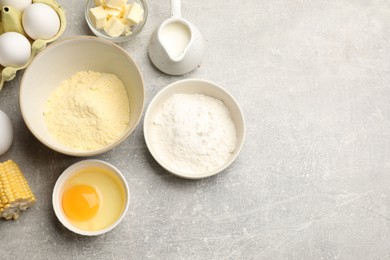 Photo of Cornbread preparation. Different ingredients on light grey table, flat lay. Space for text