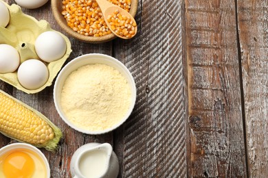 Photo of Cornbread preparation. Different ingredients on wooden table, flat lay. Space for text