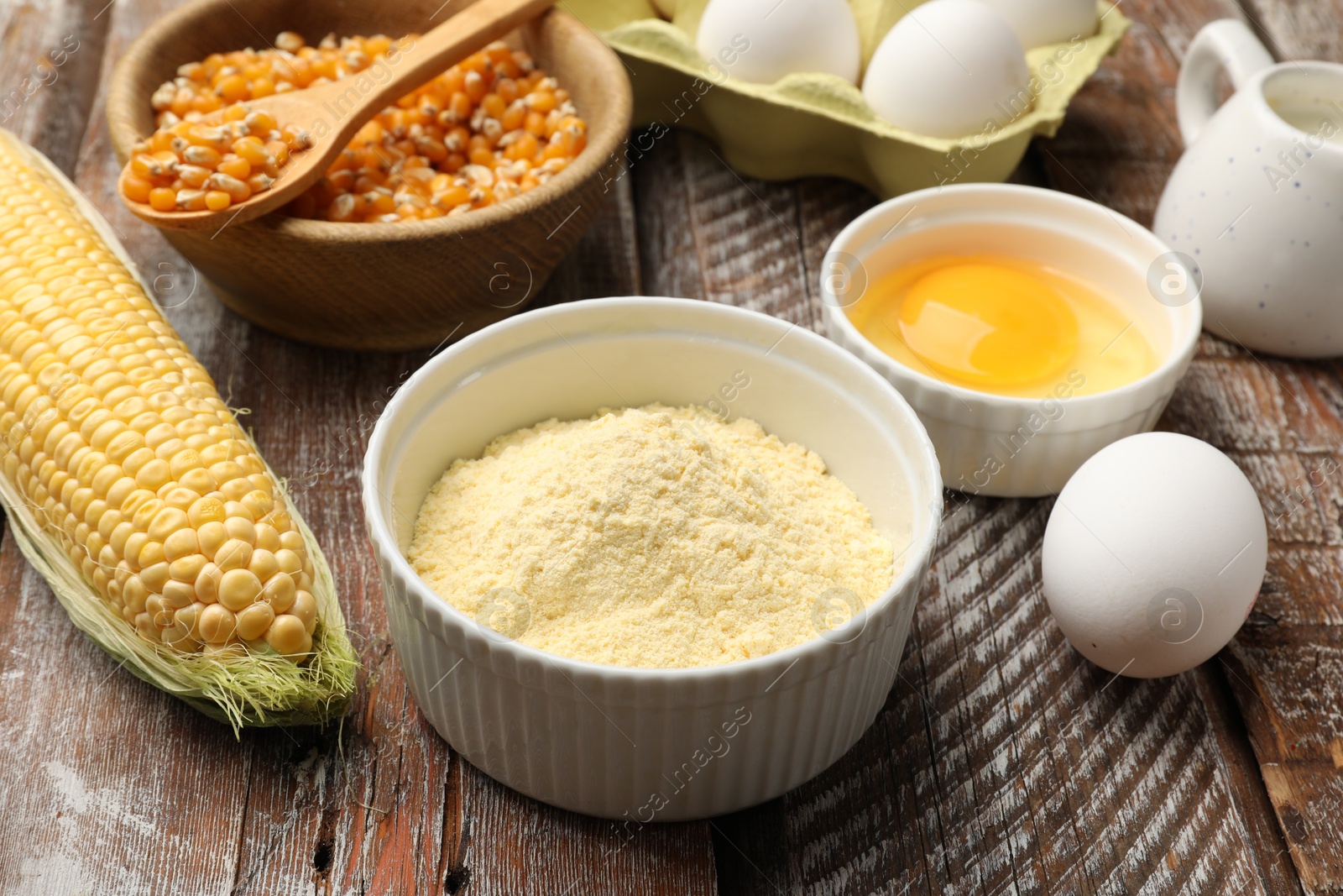 Making cornbread. Different ingredients on light blue wooden table, closeup Photo of Making cornbread. Different ingredients on light blue wooden table, closeup