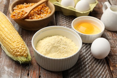 Photo of Making cornbread. Different ingredients on light blue wooden table, closeup