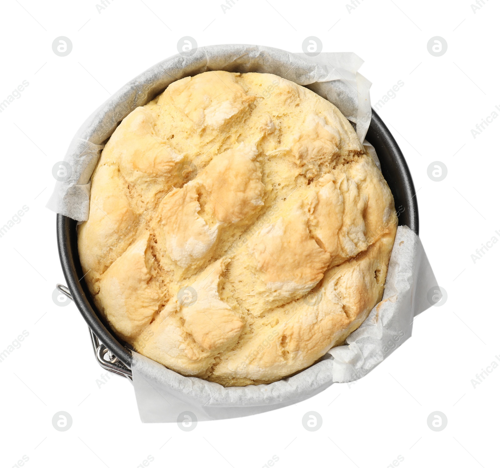 Photo of Freshly baked cornbread in cake pan isolated on white, top view