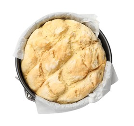 Photo of Freshly baked cornbread in cake pan isolated on white, top view