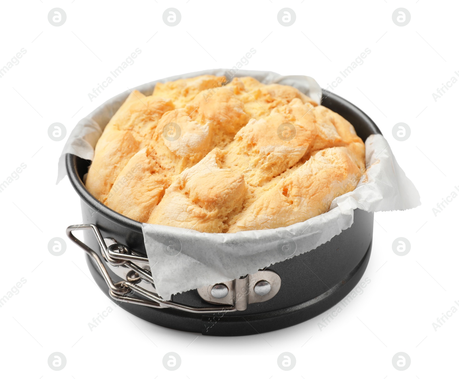 Freshly baked cornbread in cake pan isolated on white Photo of Freshly baked cornbread in cake pan isolated on white