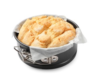 Photo of Freshly baked cornbread in cake pan isolated on white