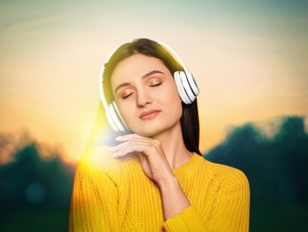 Image of Woman listening to sounds of nature which making her feel calm. Double exposure with landscape