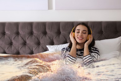 Image of Happy woman listening to sounds of nature which making her feel calm. Double exposure of bedroom and sea waves