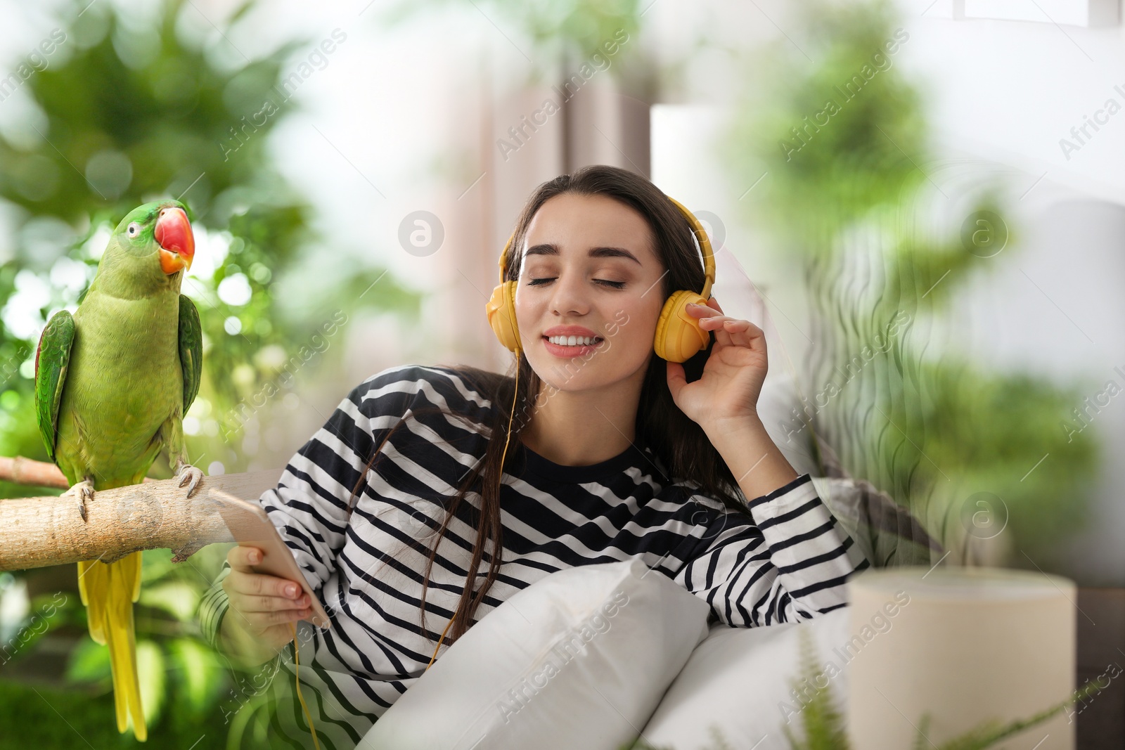 Image of Happy woman listening to sounds of nature which making her feel calm. Double exposure of room and tropical trees