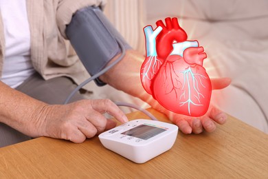 Image of Cardiology. Senior woman measuring blood pressure at table indoors, closeup. Illustration of heart