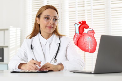 Image of Cardiologist with stethoscope working at white table in clinic. Illustration of heart above laptop