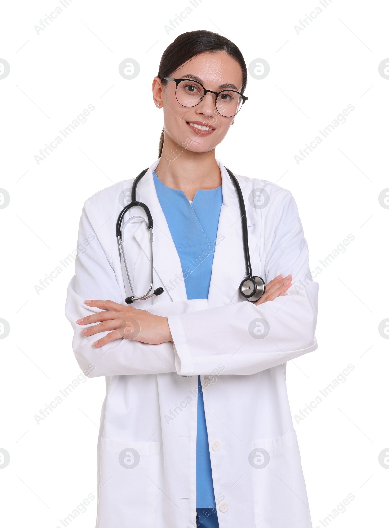 Smiling doctor in uniform, stethoscope and glasses with crossed arms on white background Photo of Smiling doctor in uniform, stethoscope and glasses with crossed arms on white background