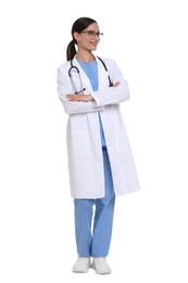 Photo of Smiling doctor in uniform, stethoscope and glasses with crossed arms on white background