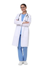 Photo of Smiling doctor in uniform, stethoscope and glasses with crossed arms on white background