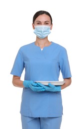 Photo of Nurse in uniform, medical mask and protective gloves with tray on white background