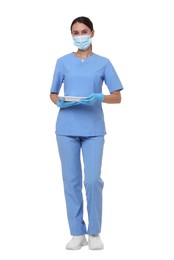 Photo of Nurse in uniform, medical mask and protective gloves with tray on white background