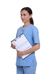 Photo of Smiling nurse in uniform with patient's medical card on white background