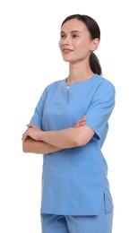 Photo of Smiling nurse in uniform with crossed arms on white background