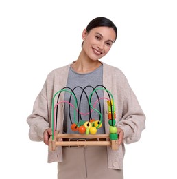 Photo of Smiling nursery teacher with educational toy on white background