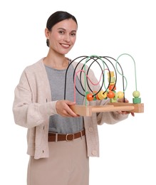 Photo of Smiling nursery teacher with educational toy on white background