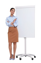 Photo of Smiling businesswoman near flip chart on white background. Space for text