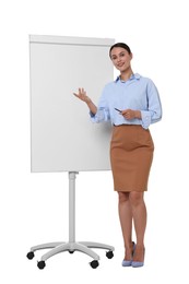 Photo of Smiling businesswoman near flip chart on white background. Space for text