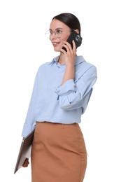 Photo of Smiling businesswoman in glasses with laptop talking by smartphone on white background