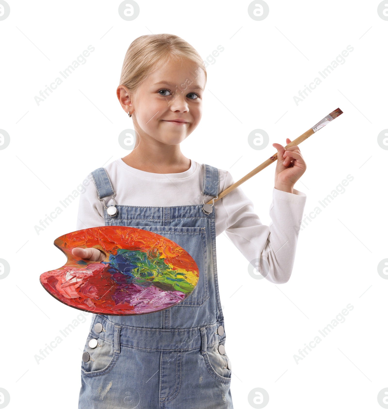Photo of Choice of profession. Little girl with palette of paints and brush pretending to be artist on white background