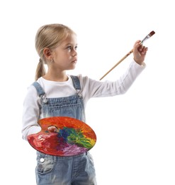 Photo of Choice of profession. Little girl with palette of paints and brush pretending to be artist on white background