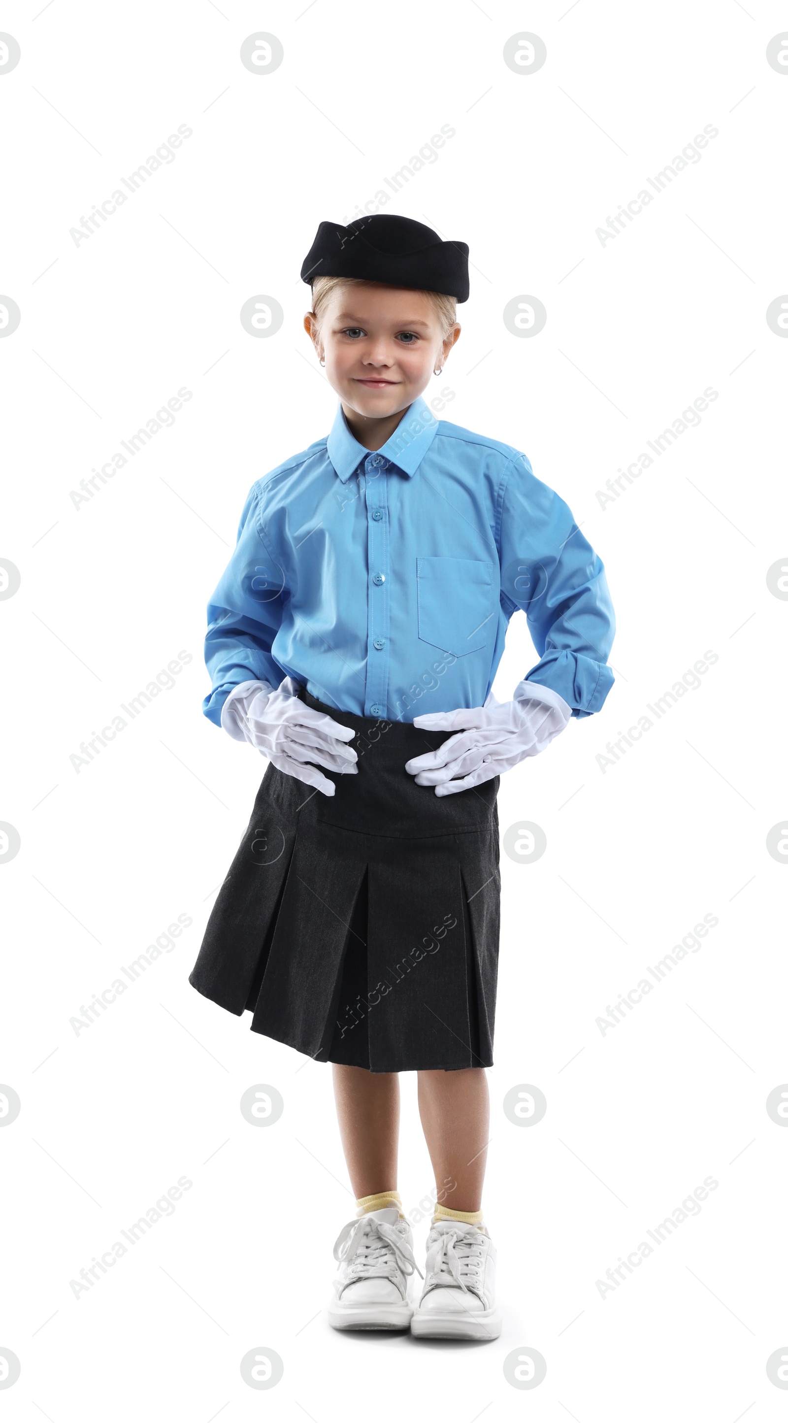 Photo of Choice of profession. Little girl pretending to be stewardess on white background