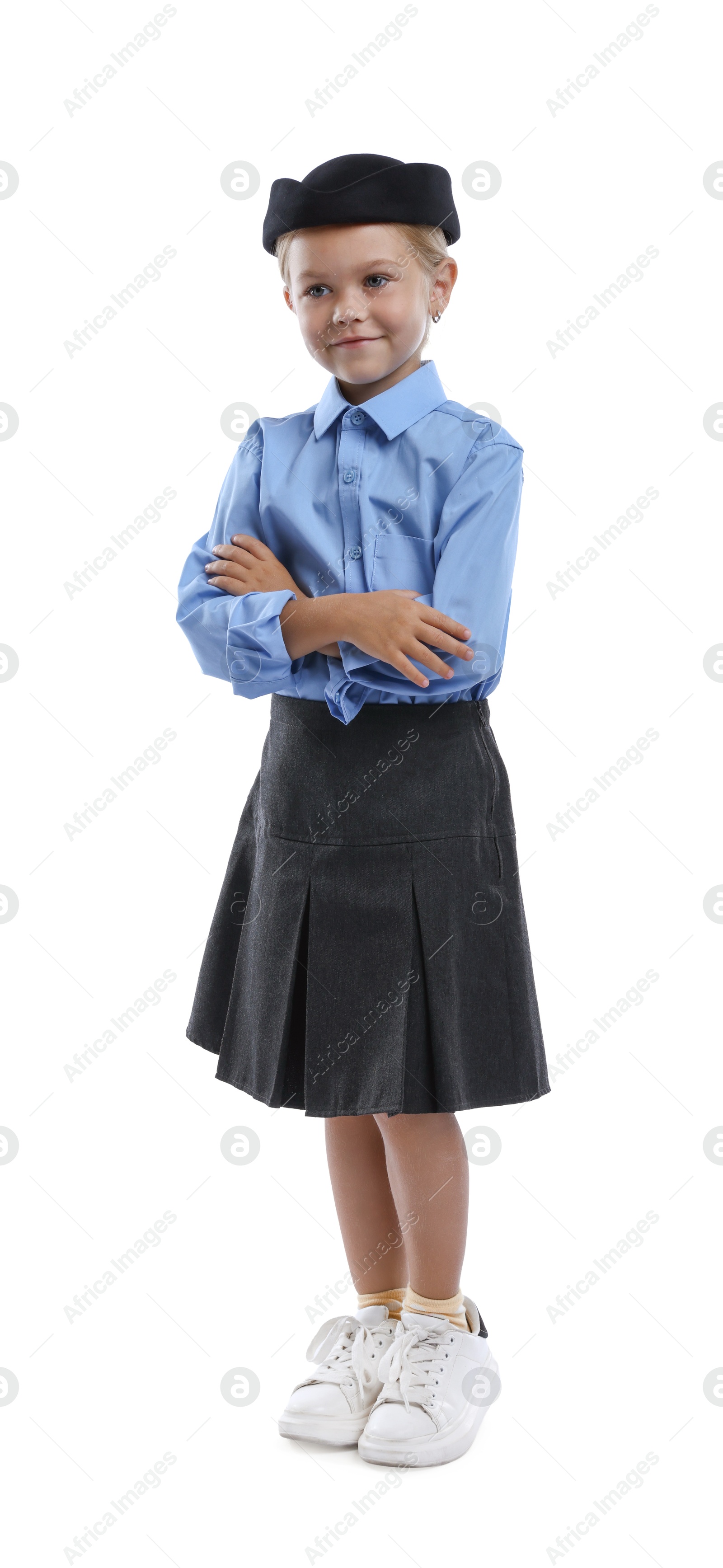 Photo of Choice of profession. Little girl pretending to be stewardess on white background