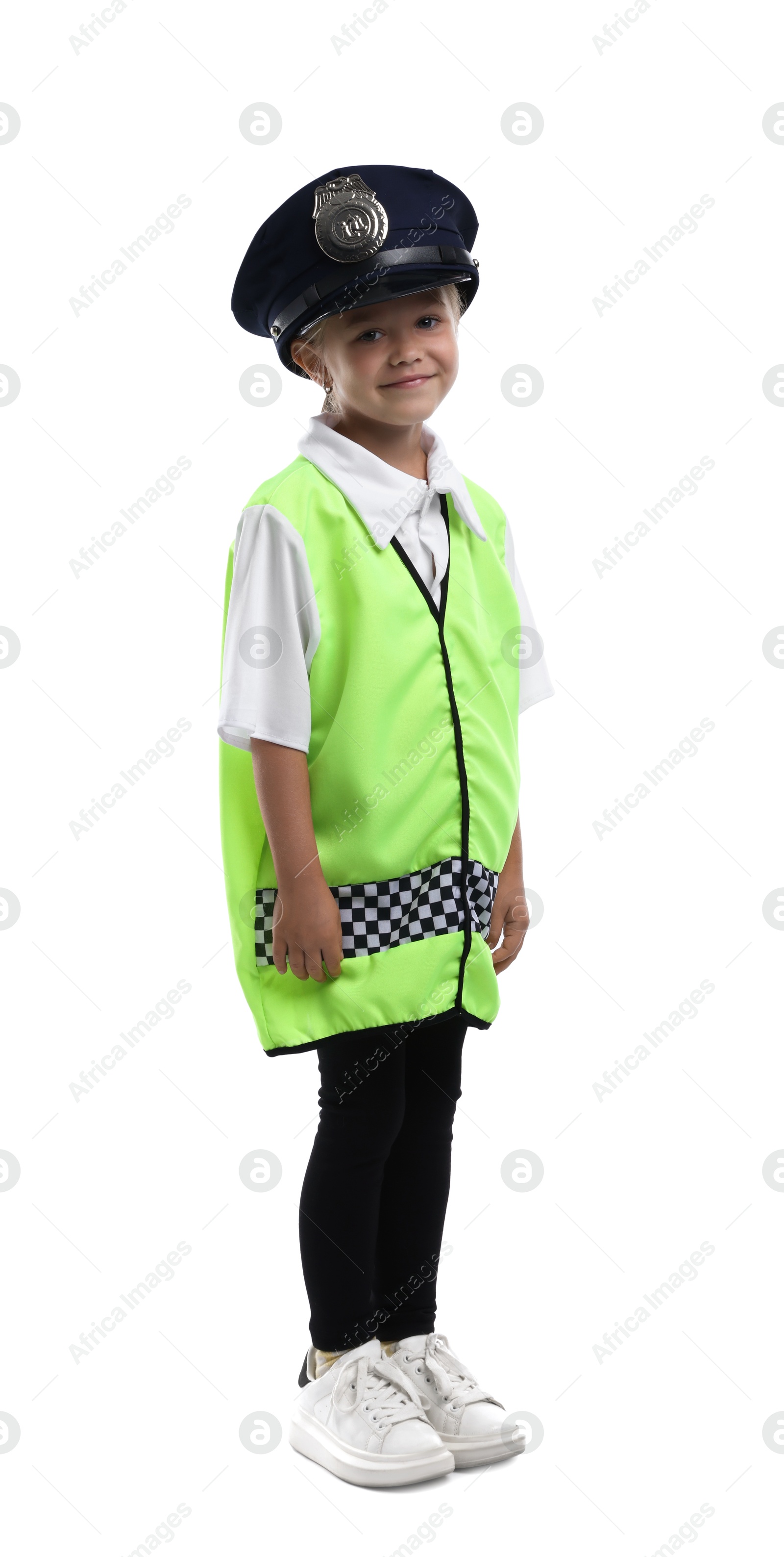 Photo of Choice of profession. Little girl in uniform pretending to be policewoman on white background