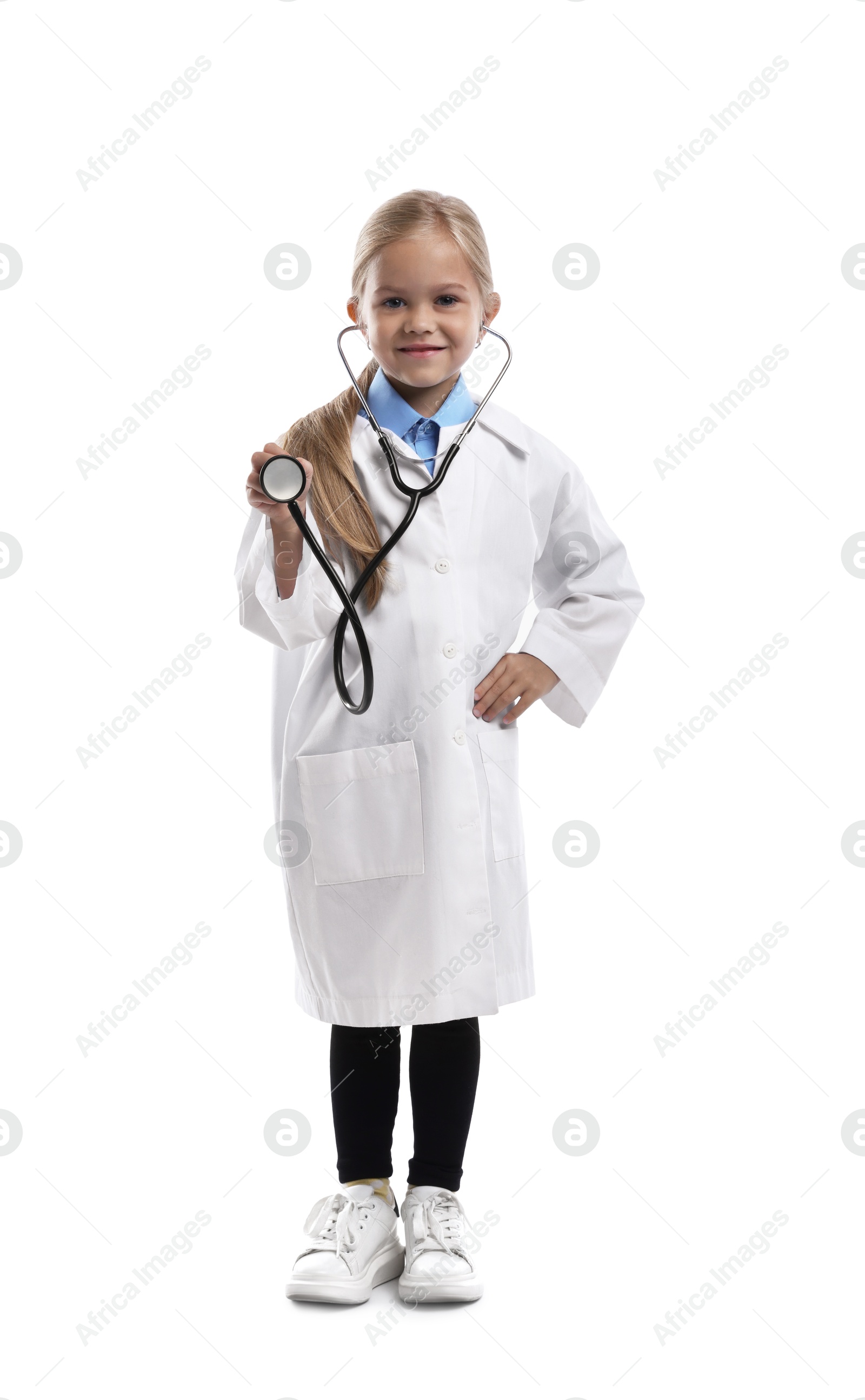 Photo of Choice of profession. Little girl with stethoscope pretending to be doctor on white background