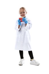 Photo of Choice of profession. Little girl with dental model pretending to be dentist on white background