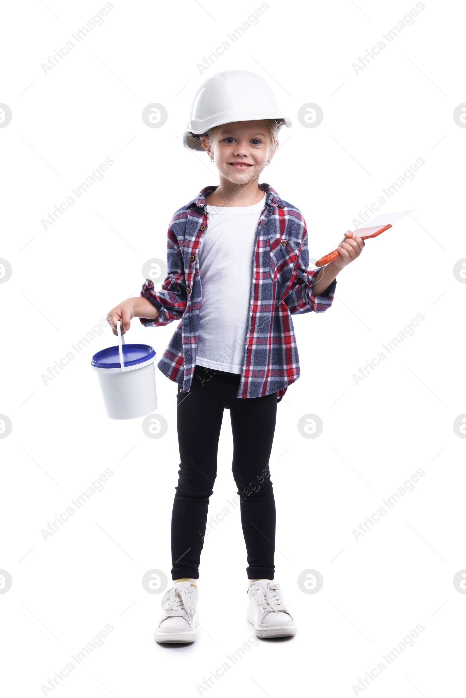 Photo of Choice of profession. Little girl in hard hat with paint and spatula pretending to be builder on white background