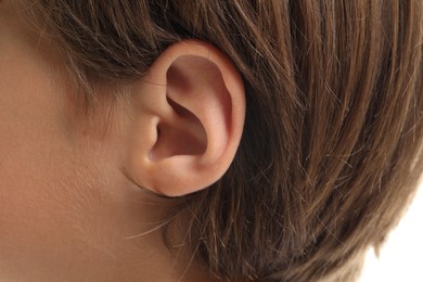 Photo of Sound. Closeup view of boy's ear and skin