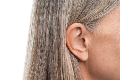 Photo of Sound. Senior woman on white background, closeup