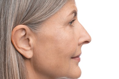 Photo of Sound. Senior woman on white background, closeup
