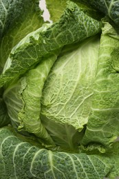 Photo of Fresh ripe Savoy cabbage as background, top view