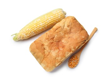 Photo of Freshly baked cornbread loaf, seeds and cob isolated on white, top view