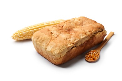 Photo of Freshly baked cornbread loaf, seeds and cob isolated on white