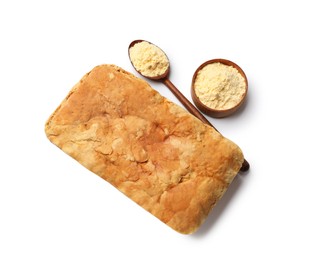 Photo of Freshly baked cornbread loaf isolated on white, top view