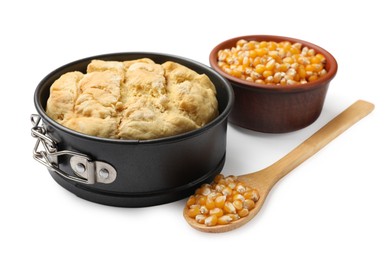 Photo of Freshly baked cornbread loaf and seeds isolated on white