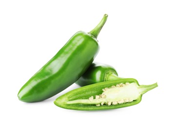 Image of Fresh green jalapeno peppers isolated on white. Whole and sliced