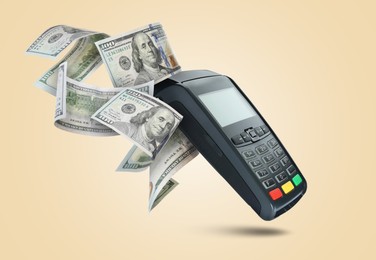 Image of Payment terminal and dollars in air on beige background