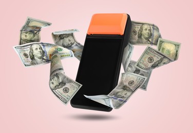 Image of Payment terminal and dollars in air on pink background