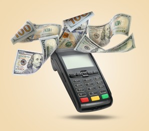 Image of Payment terminal and dollars in air on beige background