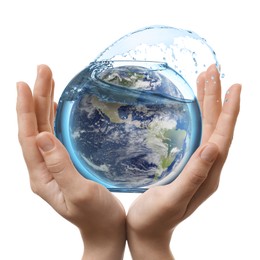 Image of Save water concept. Earth inside aquarium bowl with splashing water in woman's hands against white background